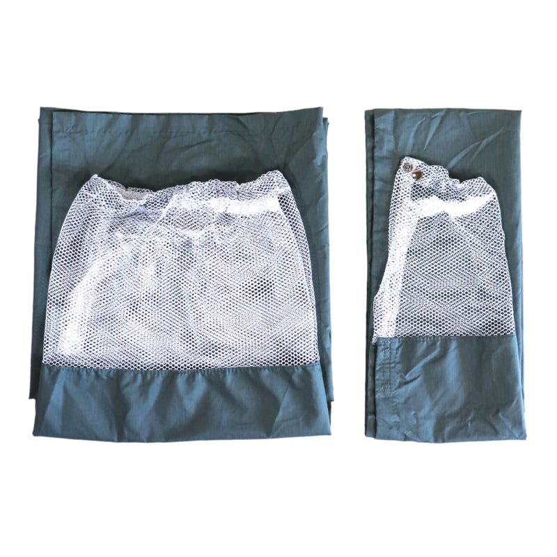 Two green privacy panels with white mesh tops, designed for use as curtains, laid out flat.