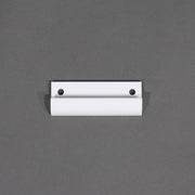 A metal roof latch strike for a camper, painted in white color, with visible mounting holes.