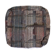 A multicolored checkered pattern cushion cover.