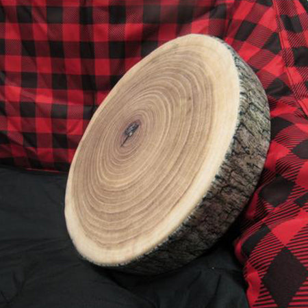 wood chip pillow sitting in a camp chair viewed from the side