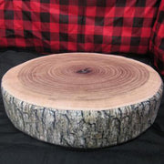 wood chip pillow sitting in a camp chair viewed from the side