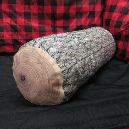 wood log pillow sitting in a camp chair viewed from an angle