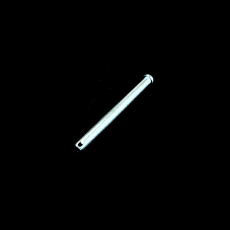 A single silver-colored metal hitch pin against a black background.