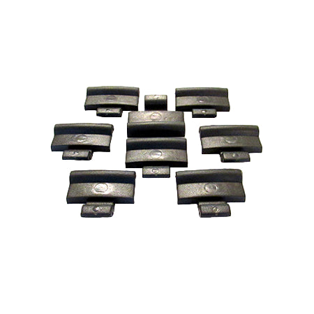 A collection of black hub cap clips arranged on a surface.