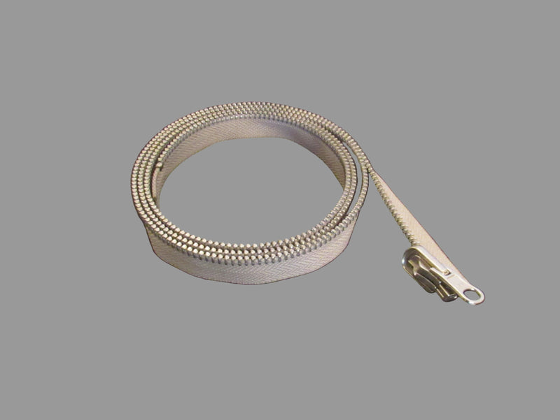 A partial view of a zipper, showing the zipper slider and part of the zipper chain, light grey in color, against a black background.