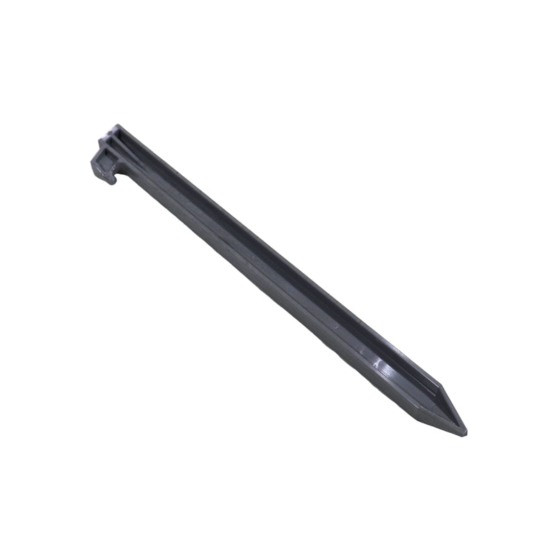 A black plastic ground stake for securing awning or tent ropes.
