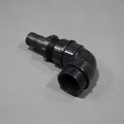 A black sink drain elbow, approximately 7 inches long by 4 inches tall.