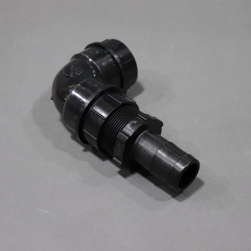 A black sink drain elbow, approximately 7 inches long by 4 inches tall shown on an angle