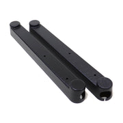 Two black metal guards for galley sink lift systems, viewed from an angle that highlights their length and the mounting screw holes.