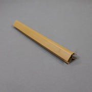 A beige-colored piece of furniture trim molding, made of plastic, displayed against a plain background.