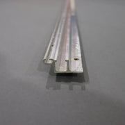 A silver metal tent track designed for hanging curtains and canvas, featuring channels for curtain hangers and a seal.