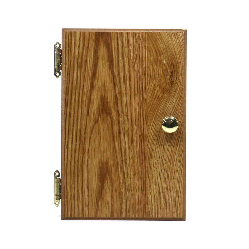 Cabinet door made of wood with a metal handle and a brass knob.