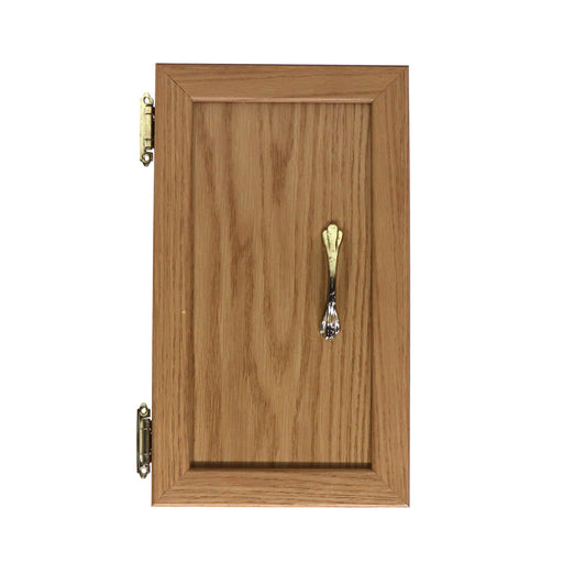 Cabinet door featuring a wood finish, a metal handle, and a metal bar pull.
