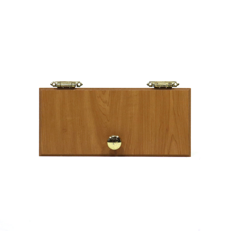 A wooden cabinet door with metal hinges and a knob.