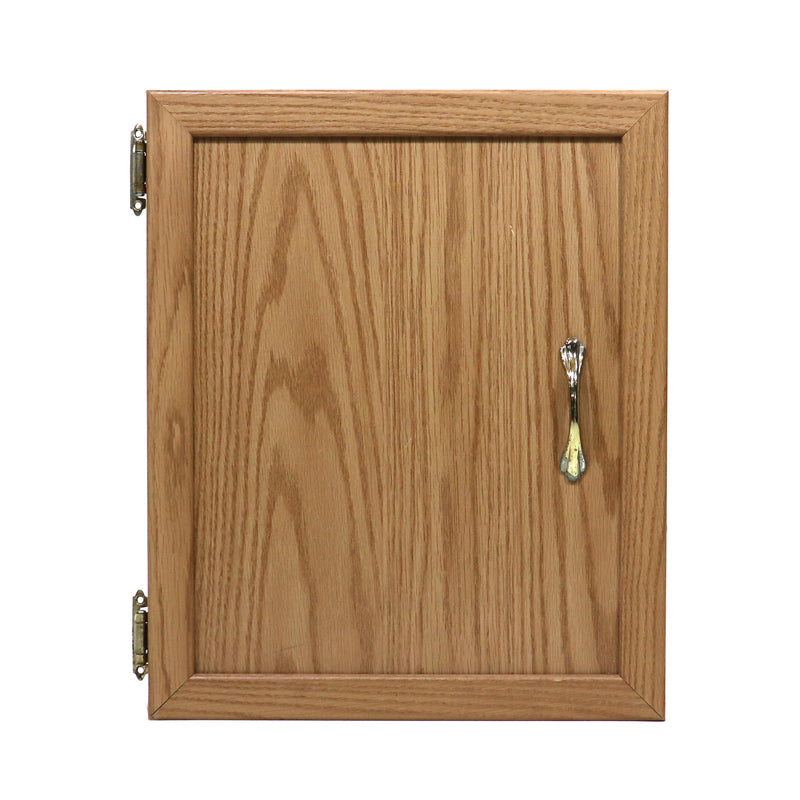 A used wooden cabinet door with a metal handle and a keyhole.