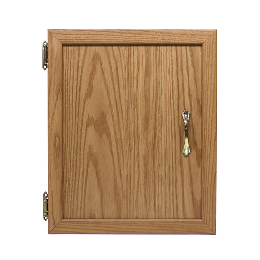 A used wooden cabinet door with a metal handle and a keyhole.
