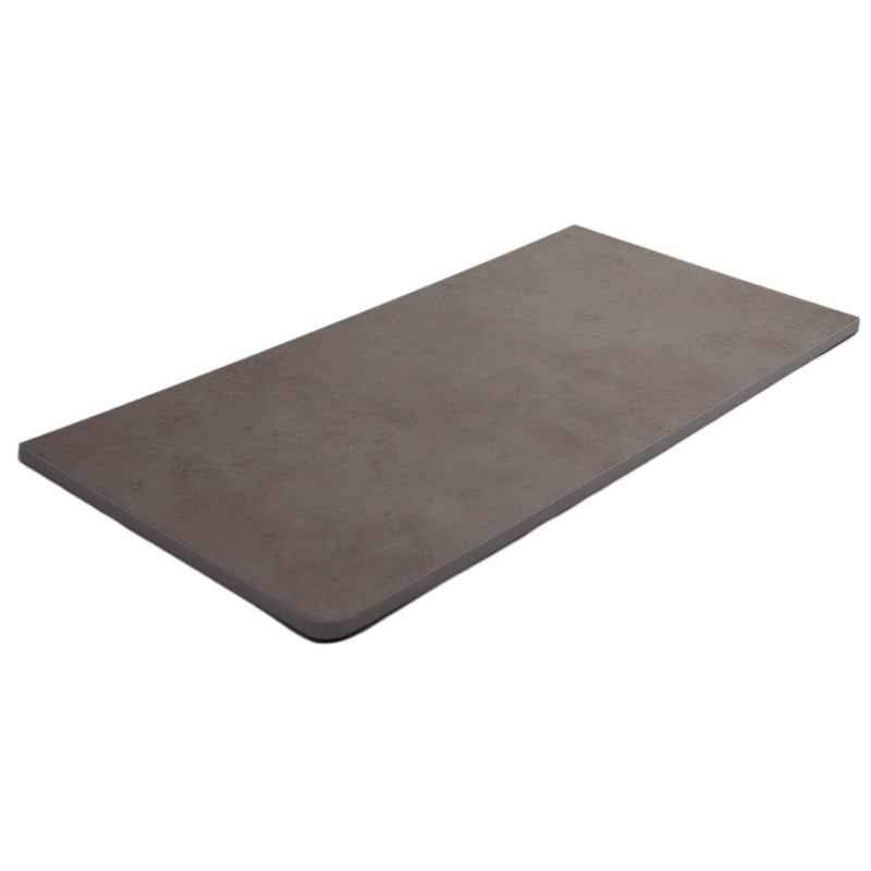 Grey countertop with one rounded corner