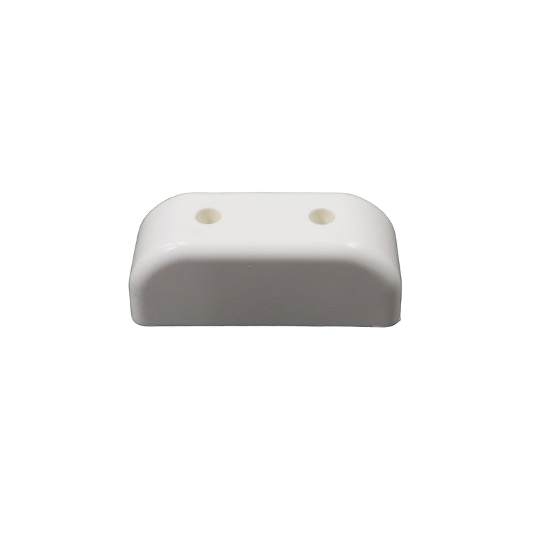 A white plastic block designed as a rest for galley sink systems, measuring 4 inches long by 1-1/2 inches wide by 1-1/2 inches tall.