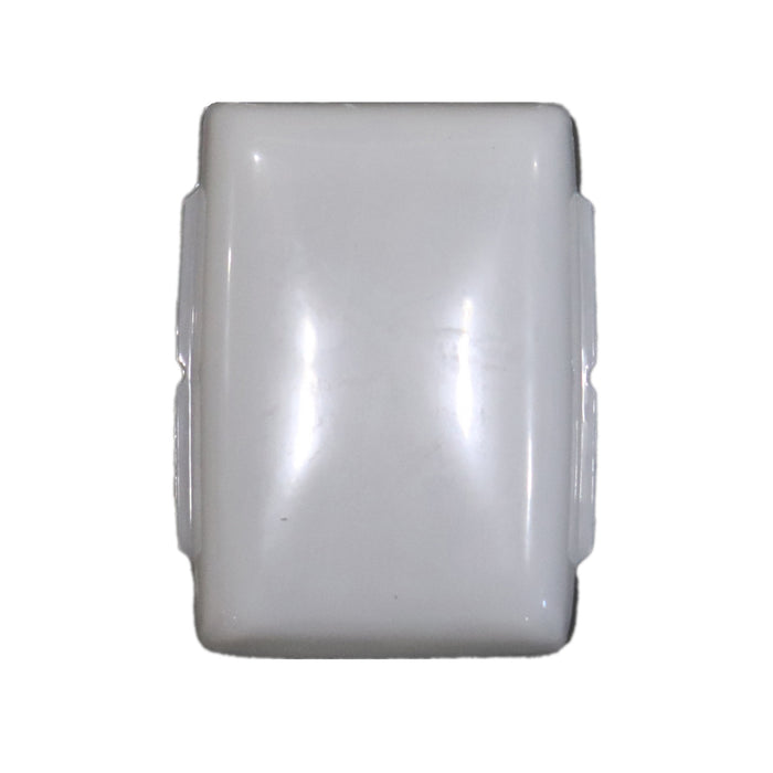 A white square-shaped ceiling and reading light lens.