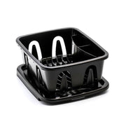 A black mini dish drainer with a sloped drainer tray and white drain rack, designed for smaller counter spaces.